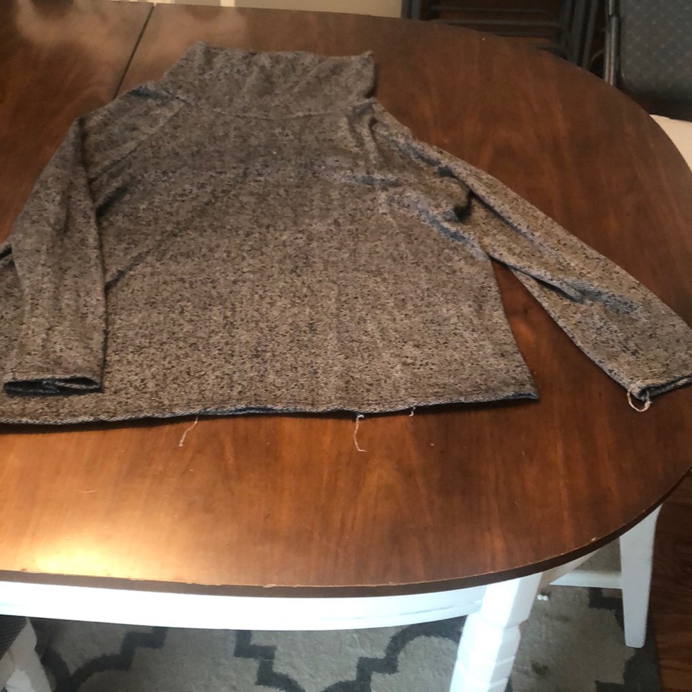 Three quarter length turtle neck top